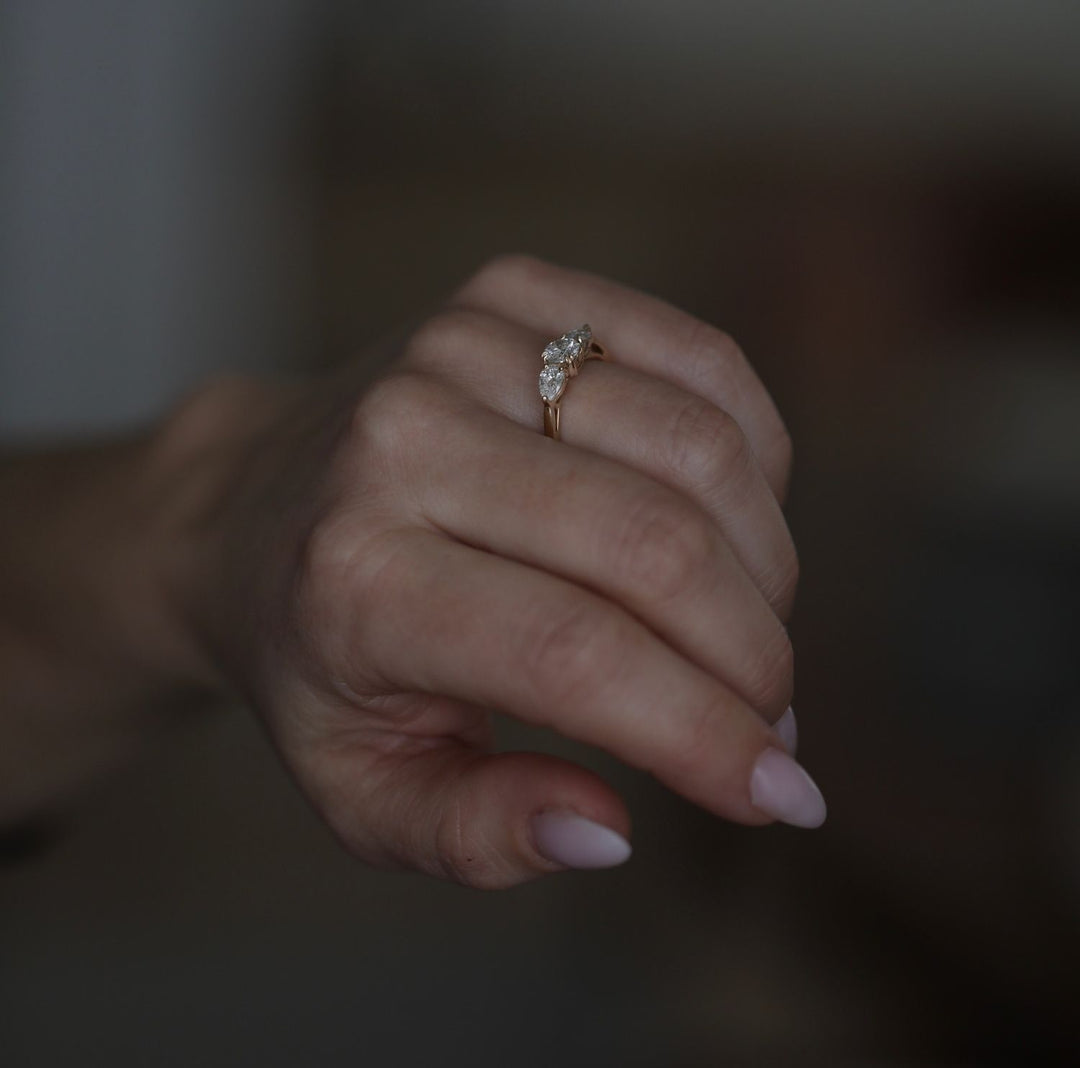 Round cut engagement ring side view showing band detail