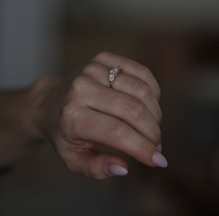 Round cut engagement ring side view showing band detail
