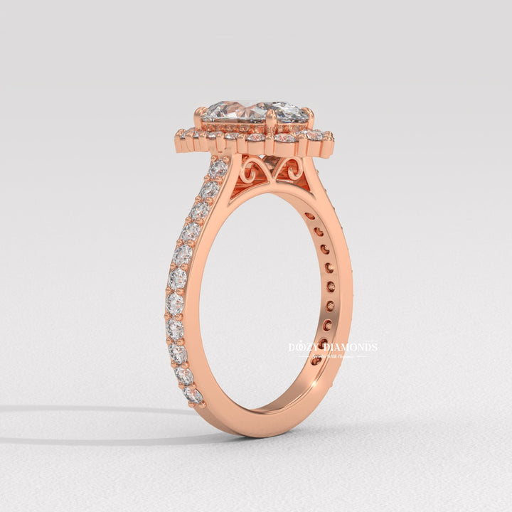Oval halo lab grown diamond ring fitted on finger