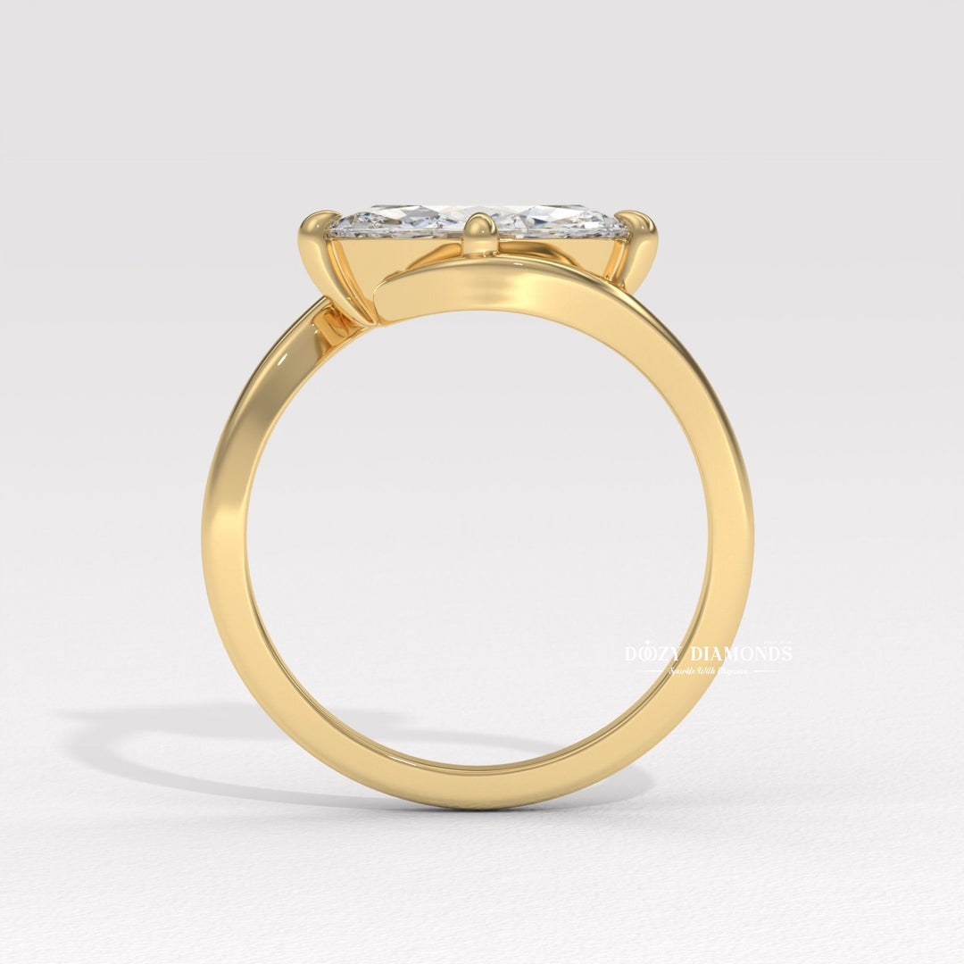 Angled view of marquise cut diamond in east west setting