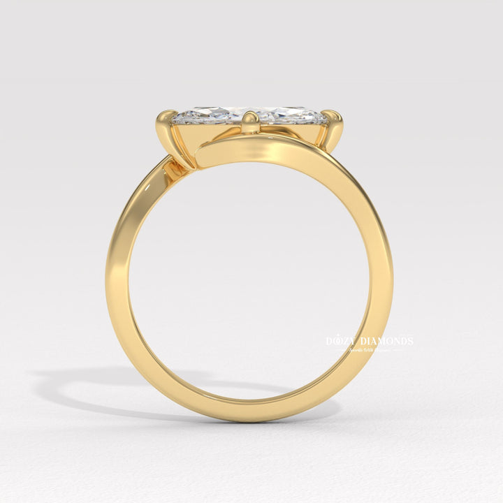 Angled view of marquise cut diamond in east west setting