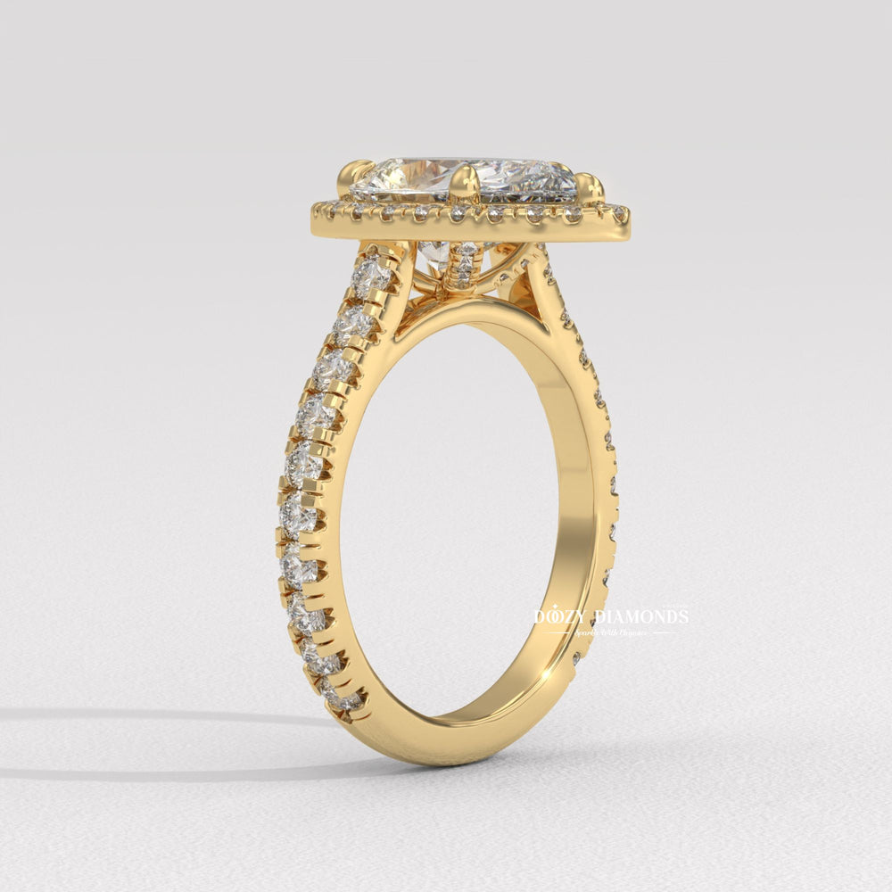 IGI certified pear cut diamond in halo engagement ring setting