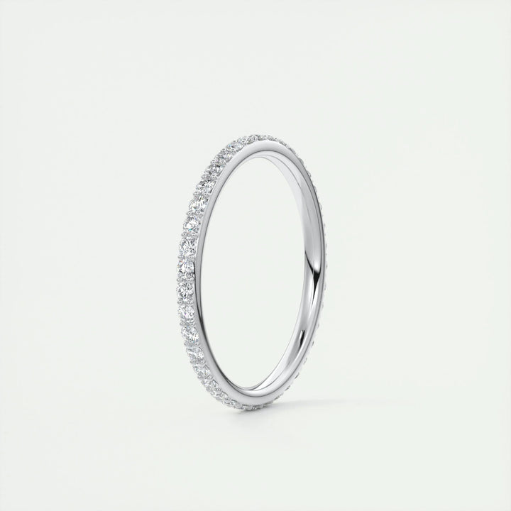 Round Brilliant diamond band stacked with engagement ring