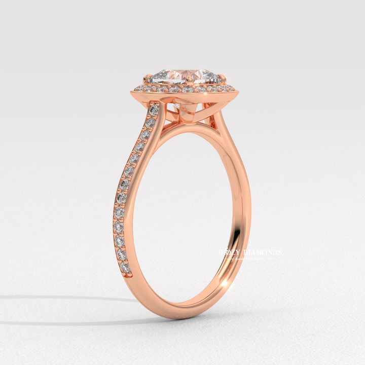 Cushion cut diamond ring worn on hand