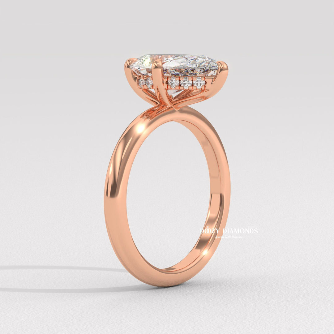 Pear hidden halo engagement ring with IGI certificate and packaging