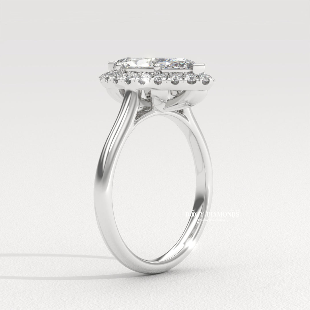 Marquise halo engagement ring viewed from the side