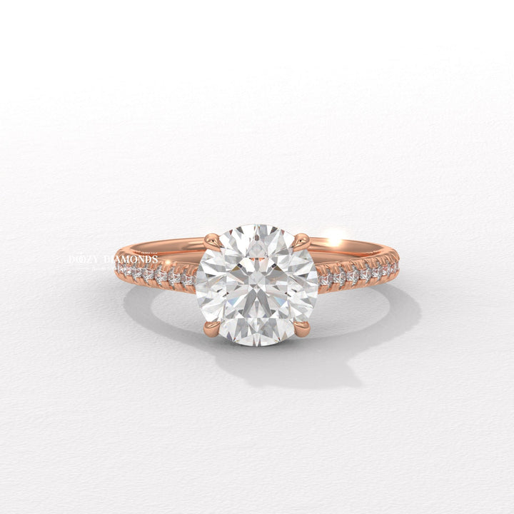 Round pave diamond engagement ring available in multiple metals