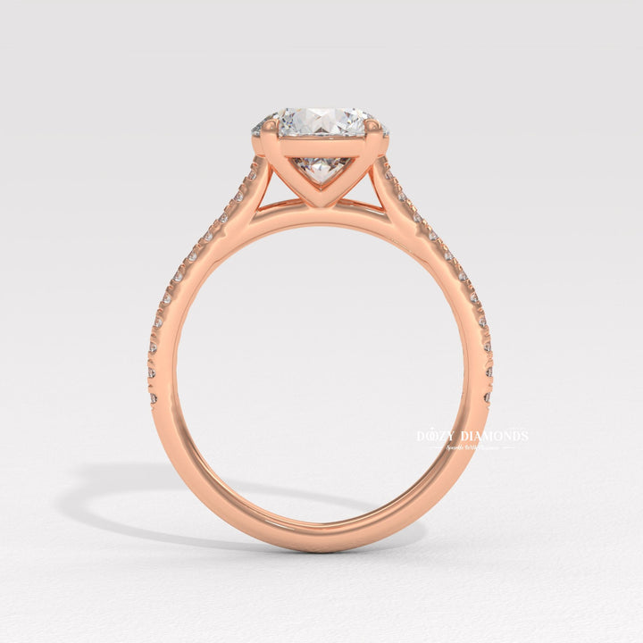Round pave engagement ring offered in gold and platinum