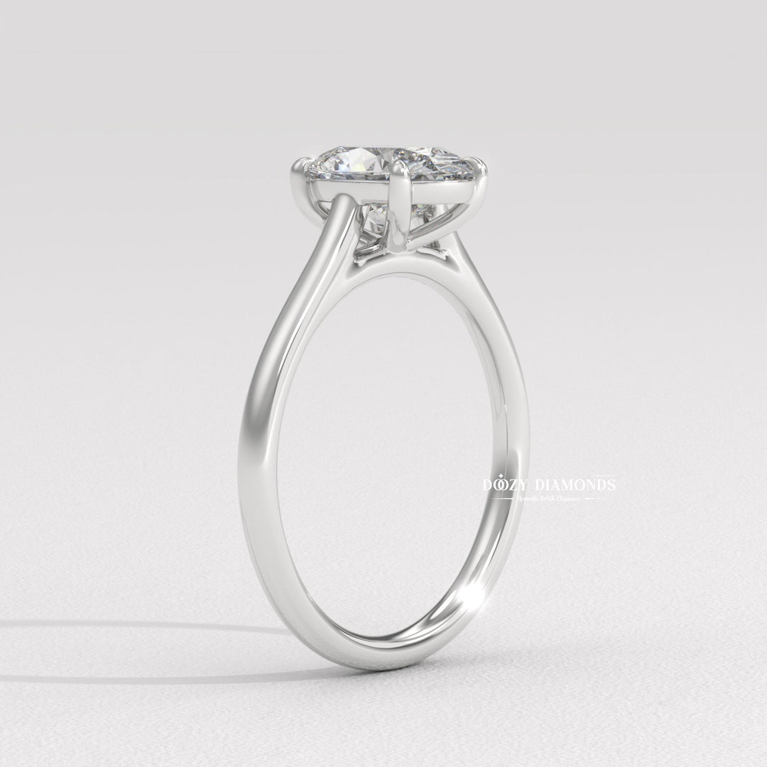 Oval solitaire lab grown diamond ring fitted on finger