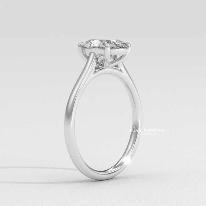 Oval solitaire lab grown diamond ring fitted on finger