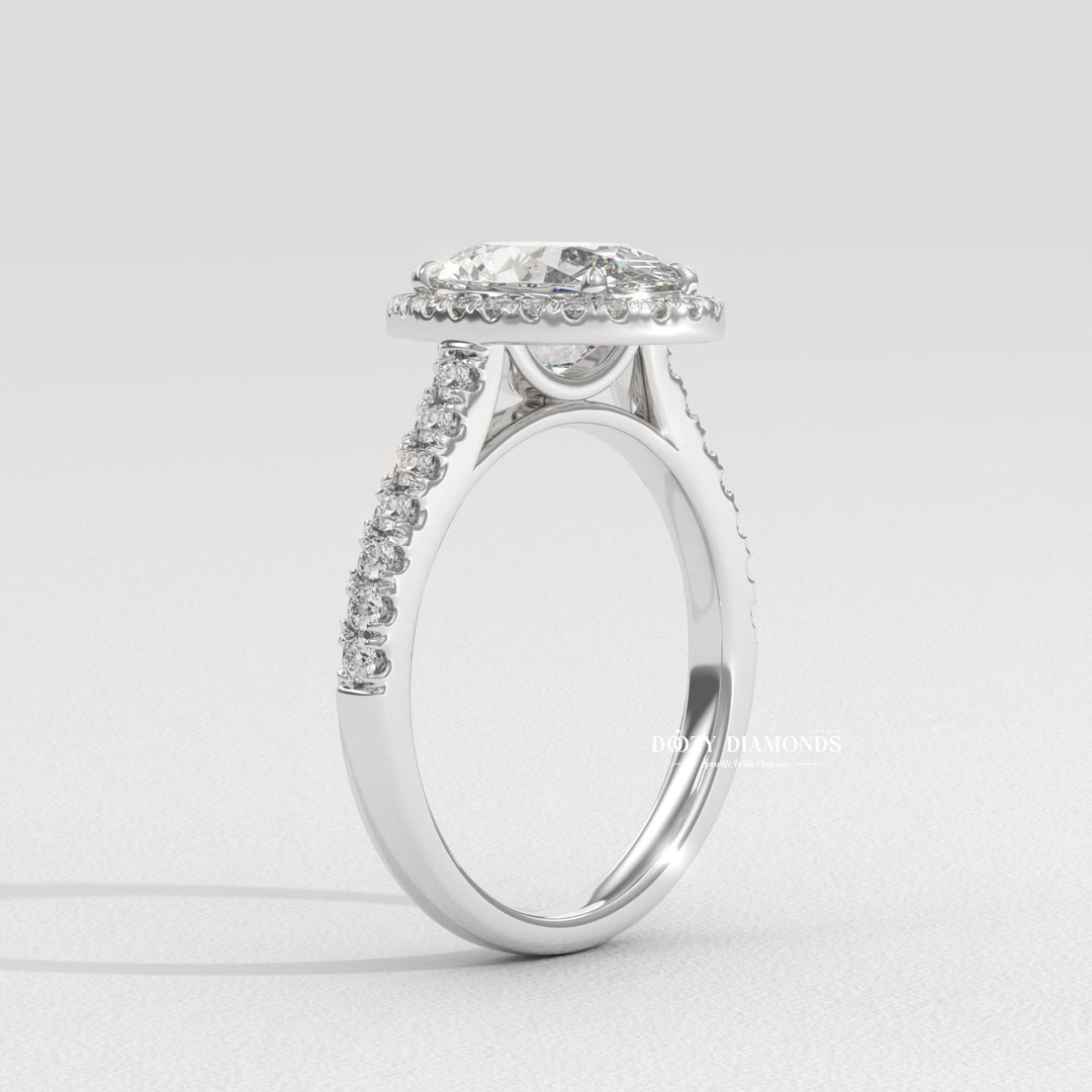 IGI certified oval cut diamond in halo engagement ring setting