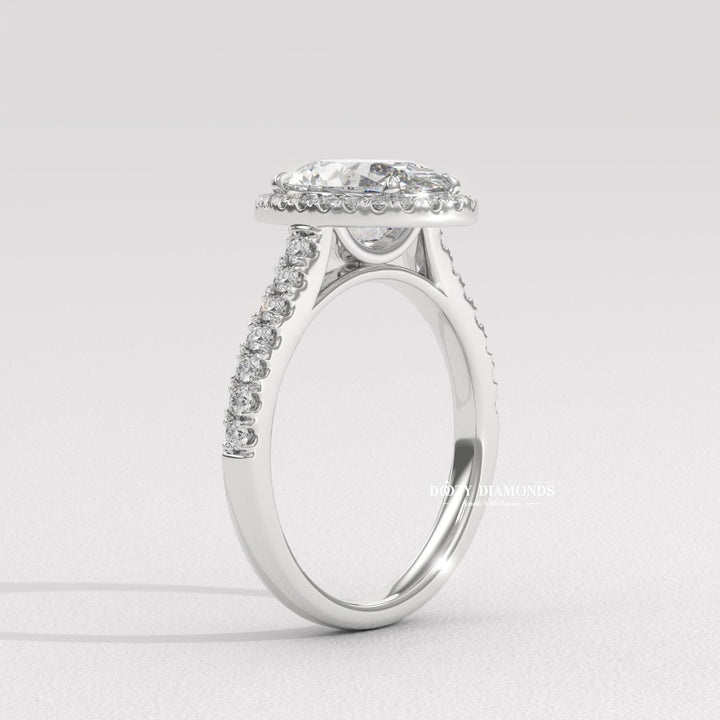 IGI certified oval cut diamond in halo engagement ring setting