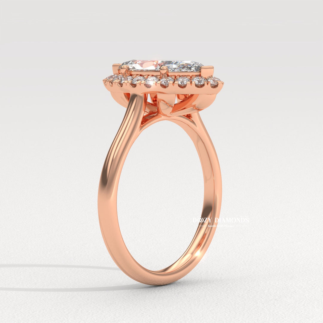 Detailed close-up of marquise halo diamond engagement ring