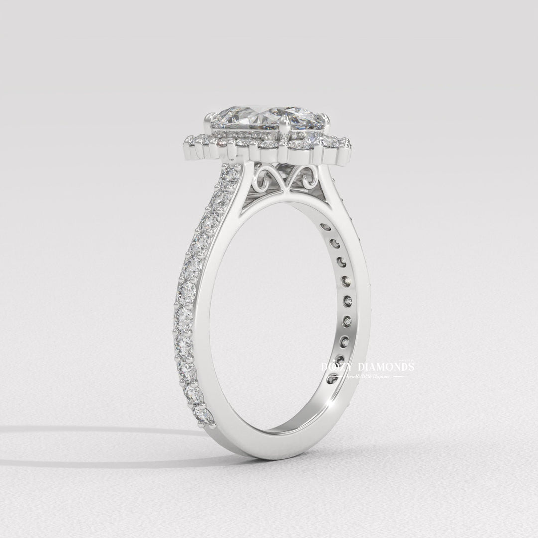 Certified oval cut diamond featured in halo engagement ring