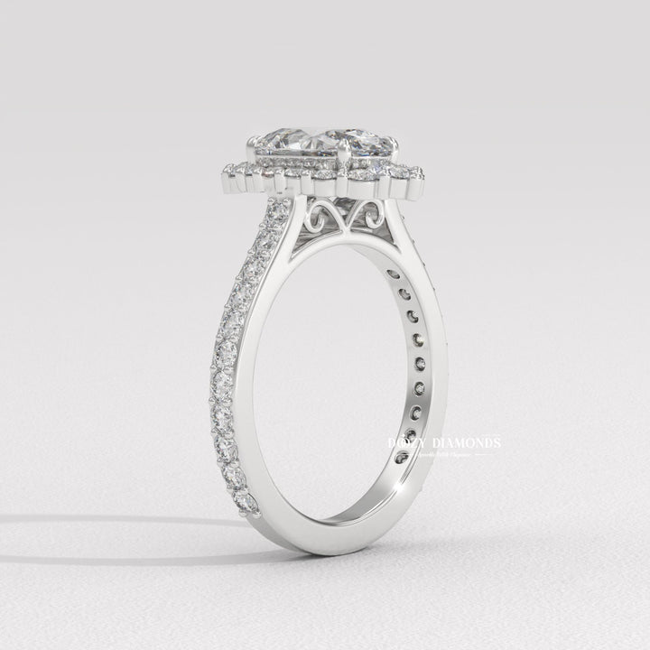 Certified oval cut diamond featured in halo engagement ring