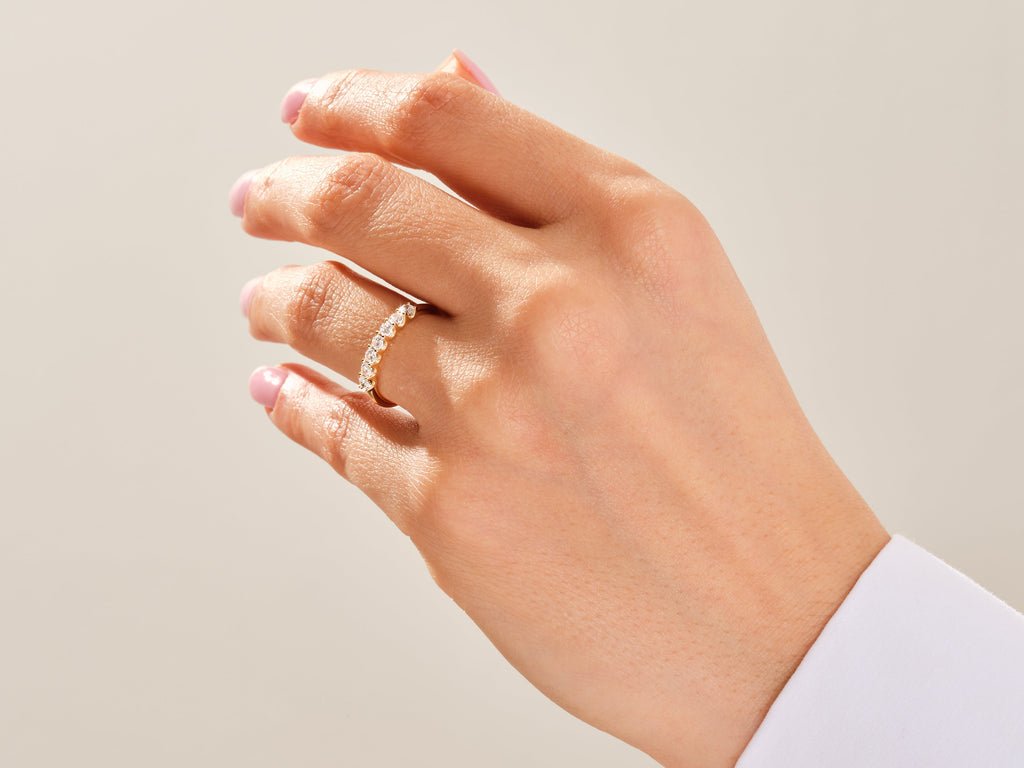 Side view of round diamond wedding band