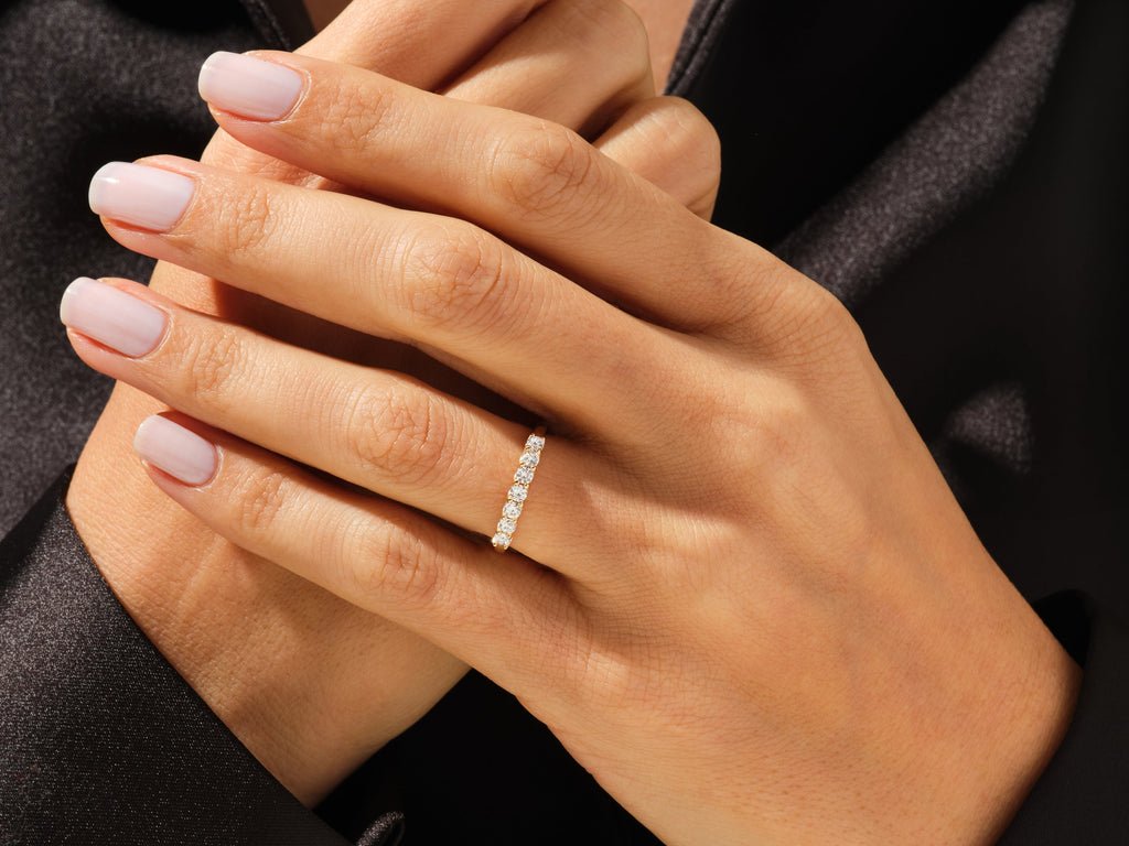 Round diamond wedding band in rose gold