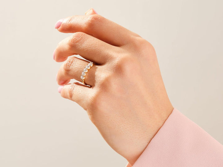 Round lab grown diamond band worn on hand