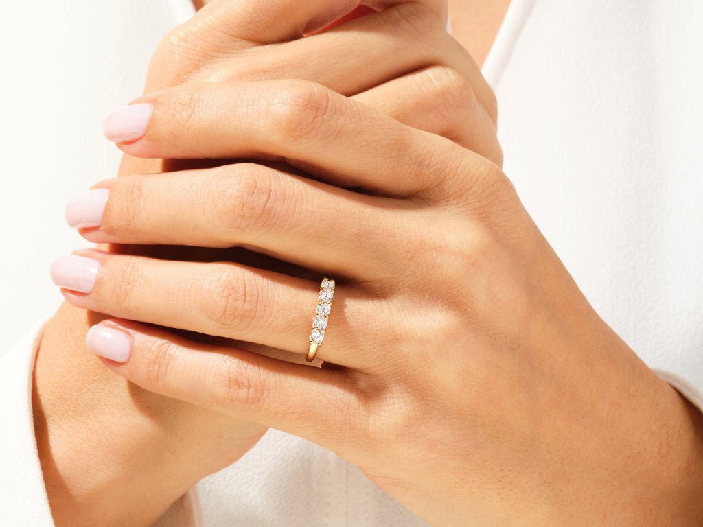 Side view of round diamond wedding band
