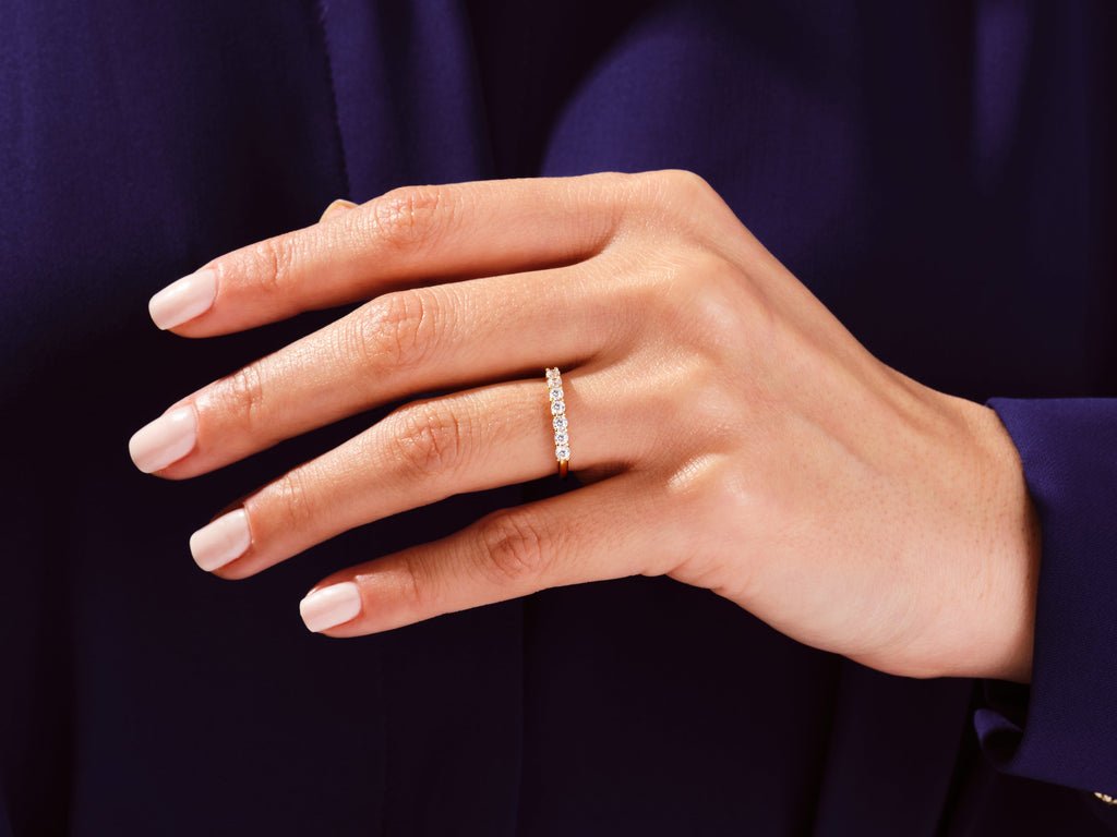 Round diamond wedding band in rose gold
