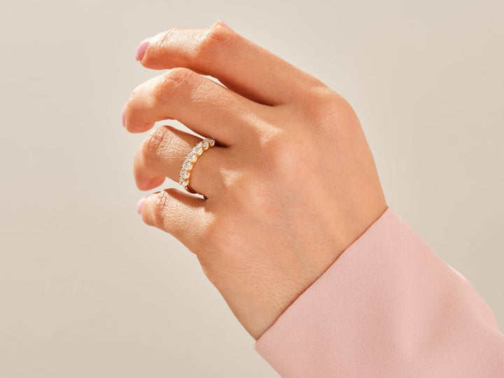 Side view of round diamond wedding band