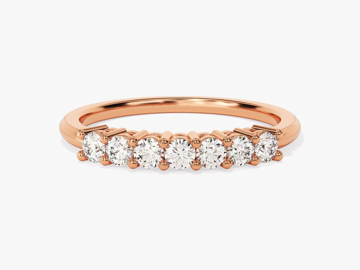 Round diamond band stacked with engagement ring