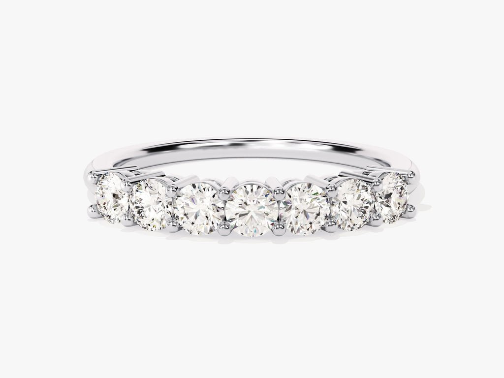 Round diamond band stacked with engagement ring