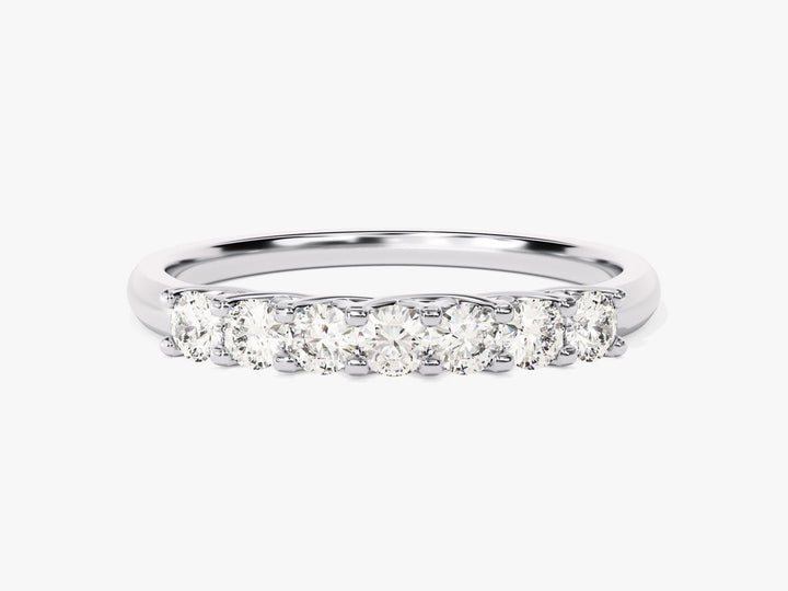 Round diamond band stacked with engagement ring