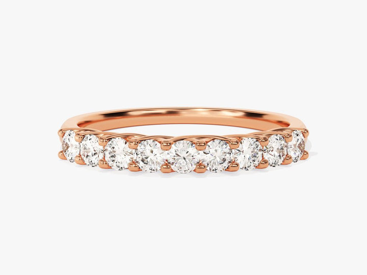 Round diamond band stacked with engagement ring