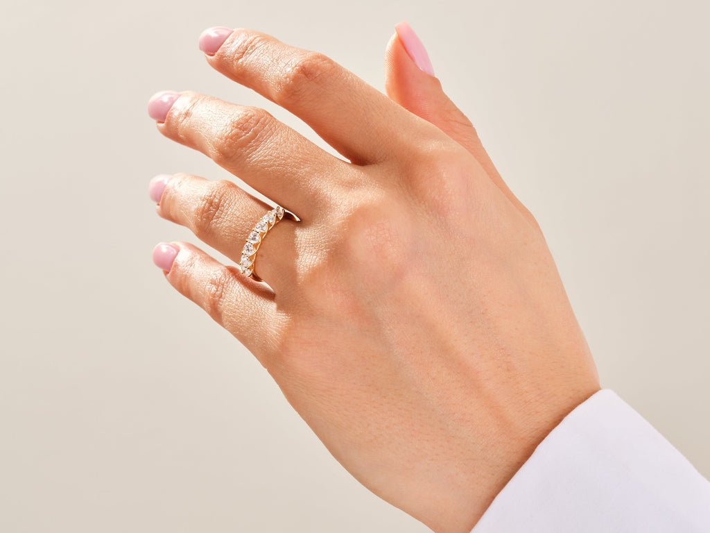 Side view of round diamond wedding band