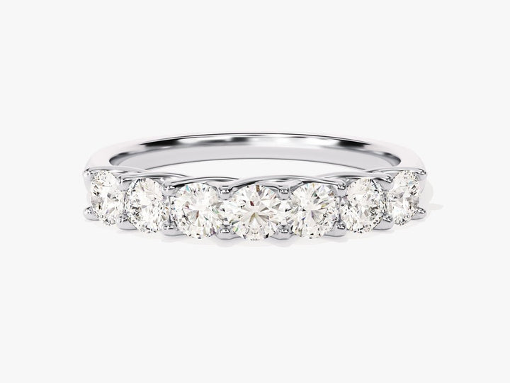 Round diamond band stacked with engagement ring