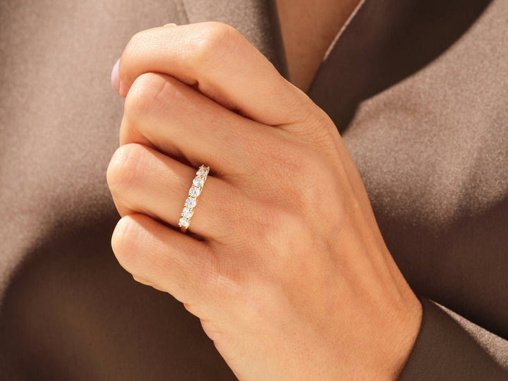 Round diamond wedding band in rose gold