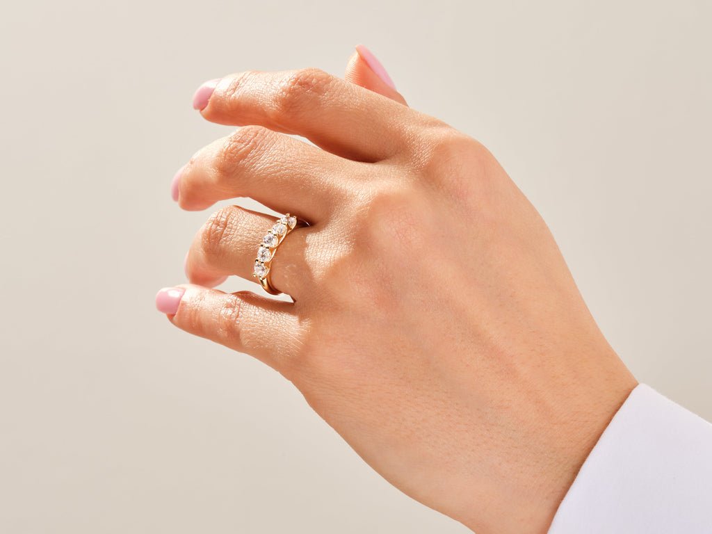 Side view of round diamond wedding band