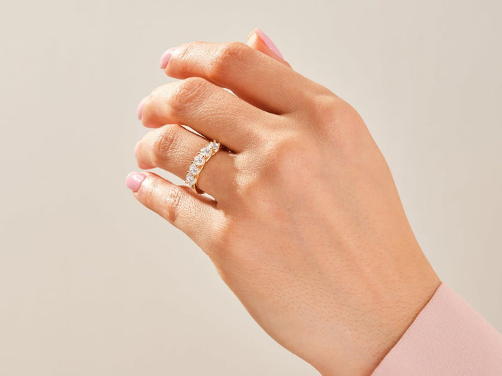 Round lab grown diamond band worn on hand