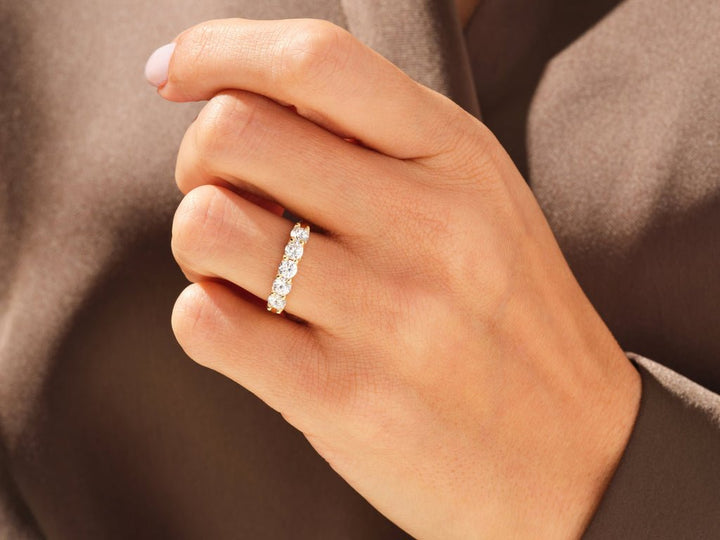 Round diamond wedding band in rose gold