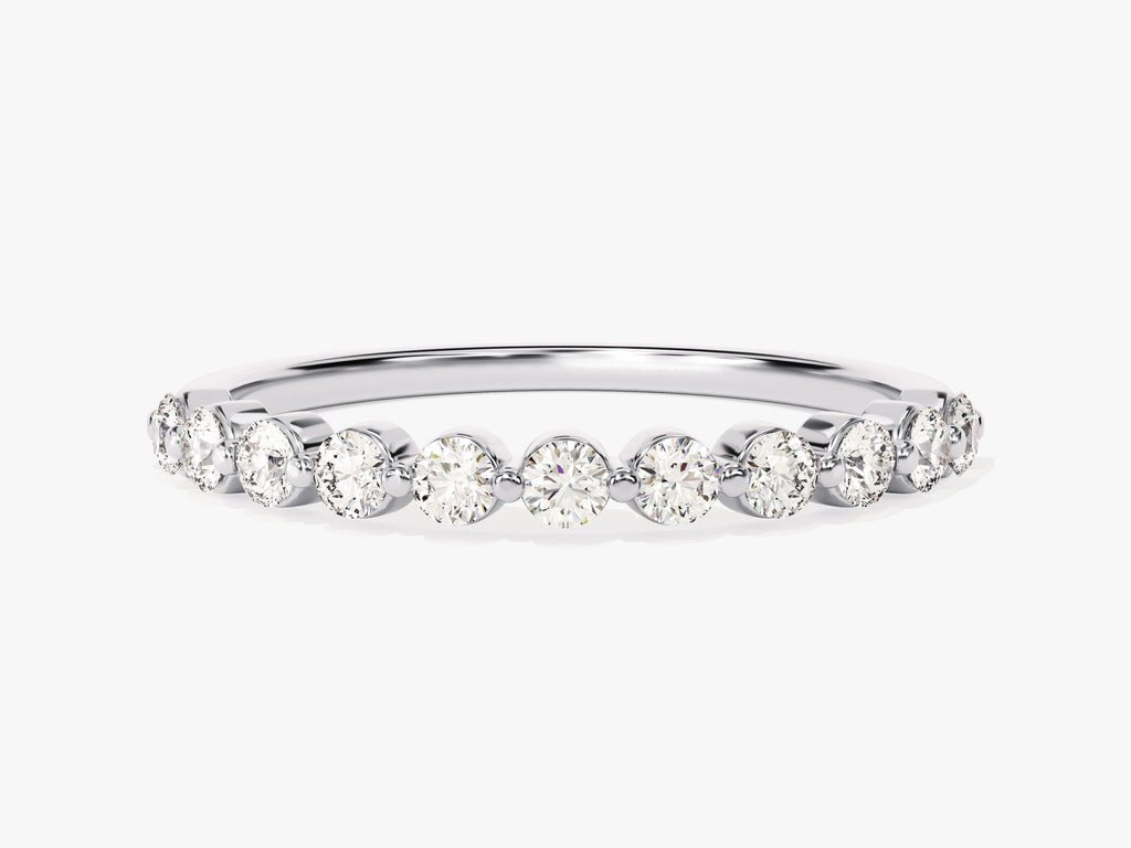 Round diamond band stacked with engagement ring