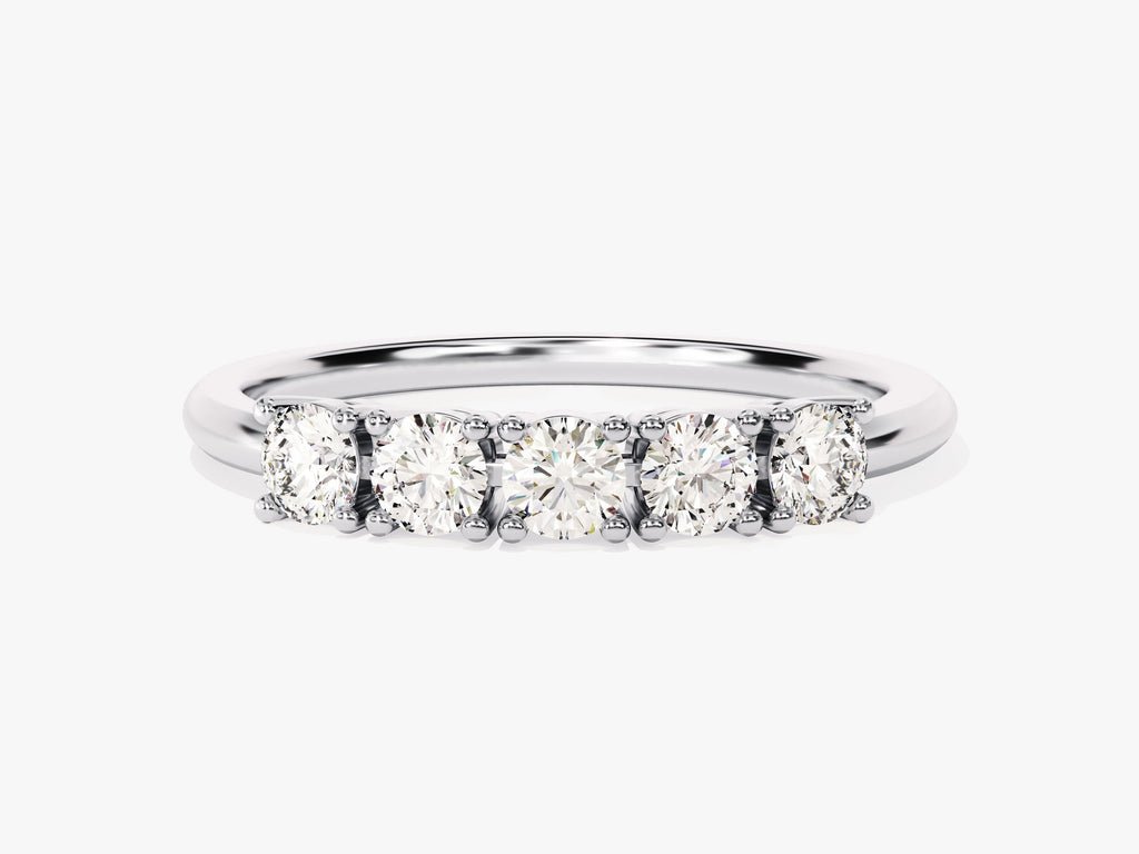 Round diamond band stacked with engagement ring