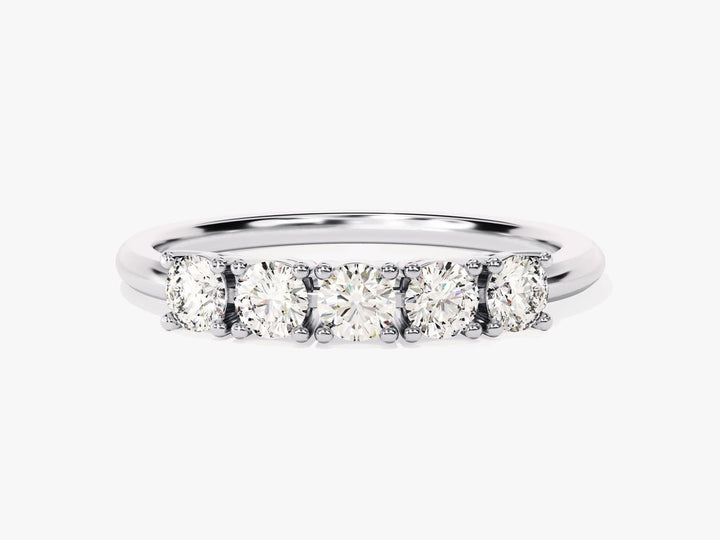 Round diamond band stacked with engagement ring