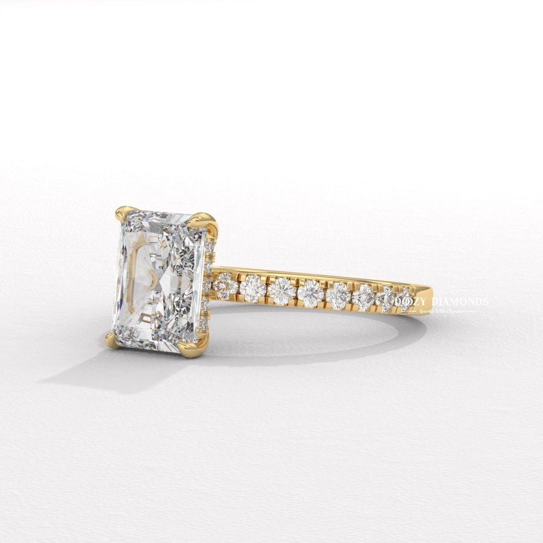 Angled view of radiant cut diamond in hidden halo setting