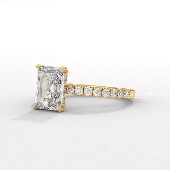 Angled view of radiant cut diamond in hidden halo setting