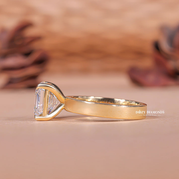 Asscher solitaire engagement ring viewed from the side