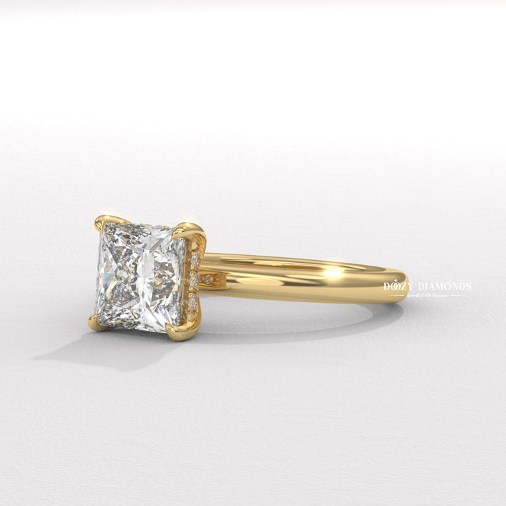 Princess cut solitaire engagement ring shown in real-life wear