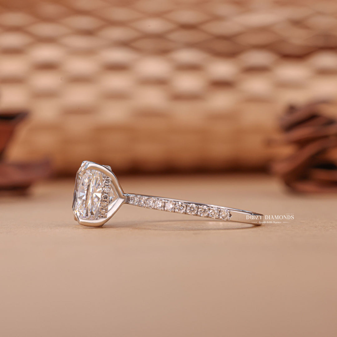 Side angle of cushion hidden halo diamond engagement ring