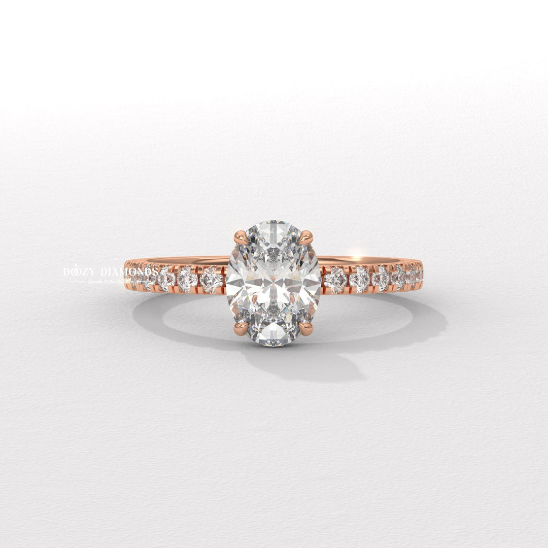 Angled view of oval cut diamond in hidden halo setting