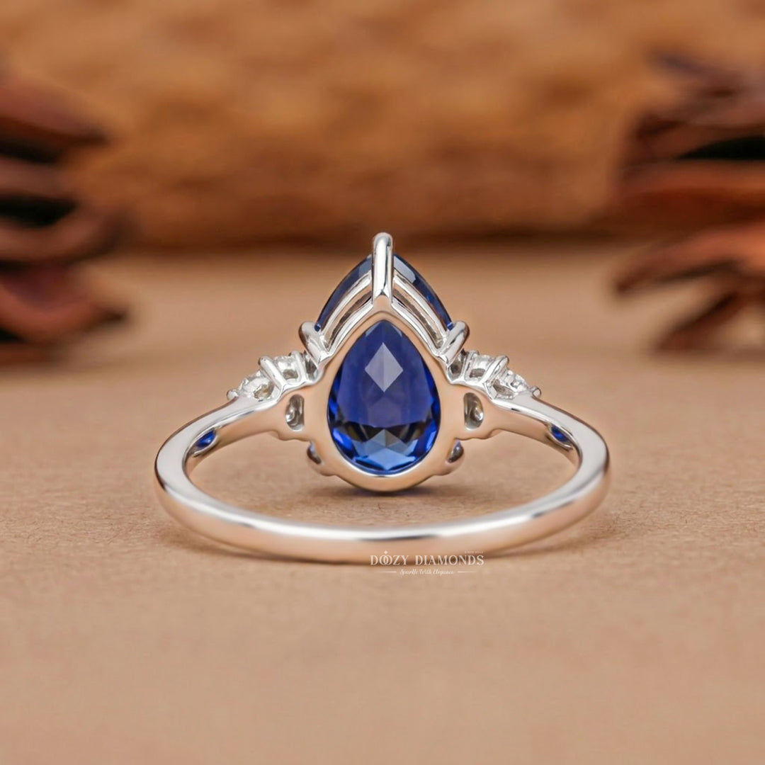 2.0CT Pear Blue Sapphire Ring Lab Grown Diamond Accents White Gold