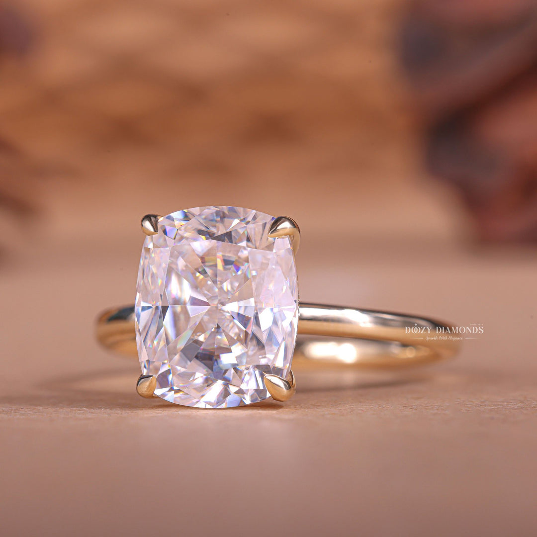 Cushion hidden halo engagement ring photographed in natural light