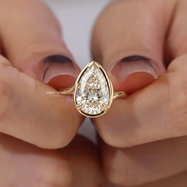 2.0CT Pear Bezel F/VVS2 Lab Grown Diamond Bypass Solitaire Engagement Ring