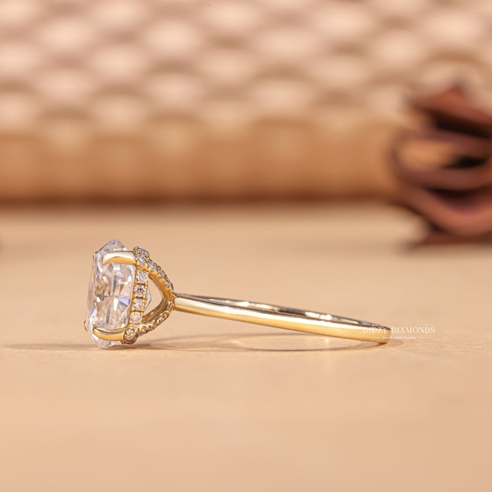 Unboxing view of oval cut hidden halo diamond engagement ring