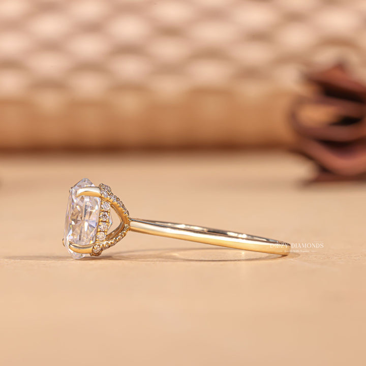 Unboxing view of oval cut hidden halo diamond engagement ring