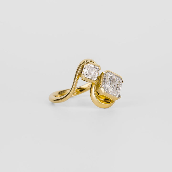 Asscher cut diamond ring worn on hand